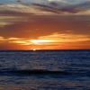 Coucher de soleil sur la plage de Saint-Gilles,...